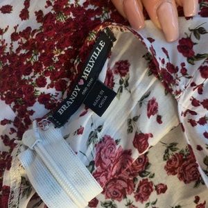 Mini summer dress with crossed straps on back.